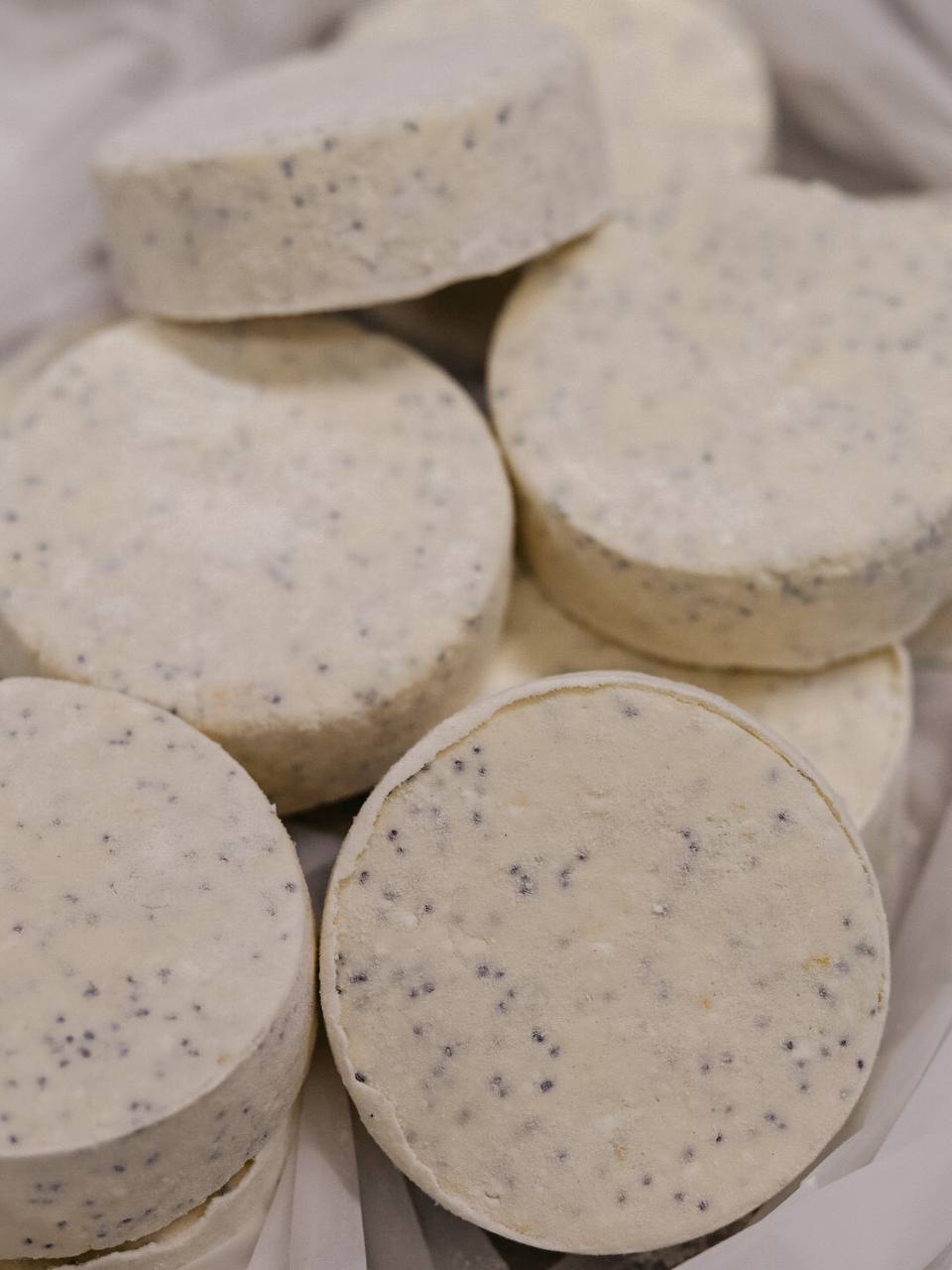 Syrniki with poppy seeds and lemon zest